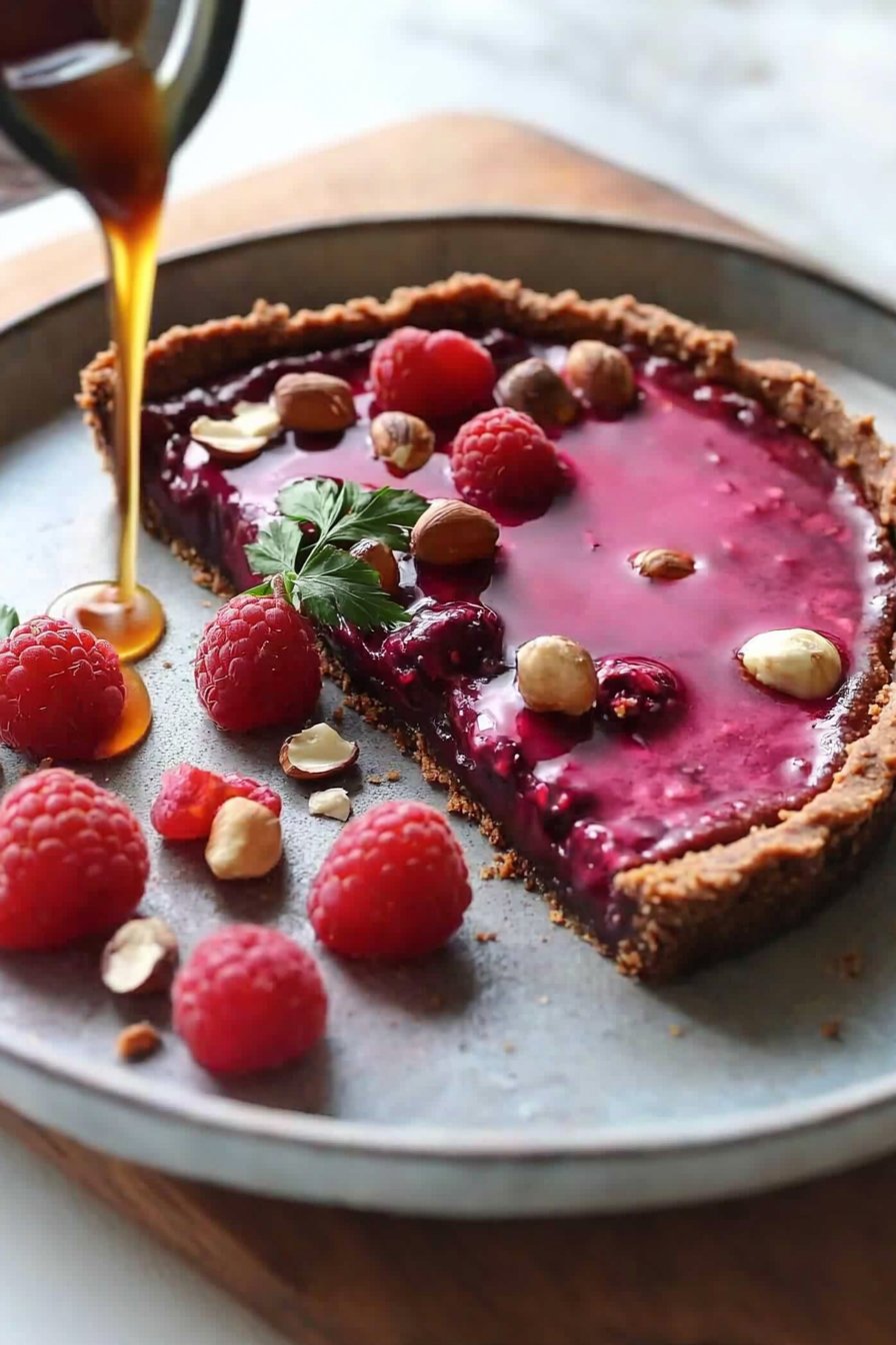 No Bake Raspberry Tart with Hazelnut Cacao Crust