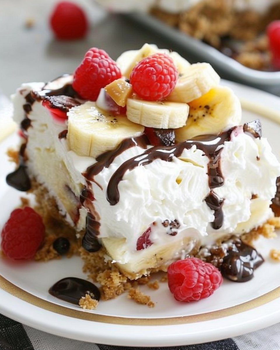 No-Bake Banana Split Dessert | Banana split dessert slice, Banana split lasagna dessert, Banana split cheesecake no bake