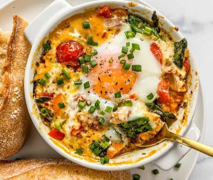 Baked Feta Eggs with Tomatoes and Spinach