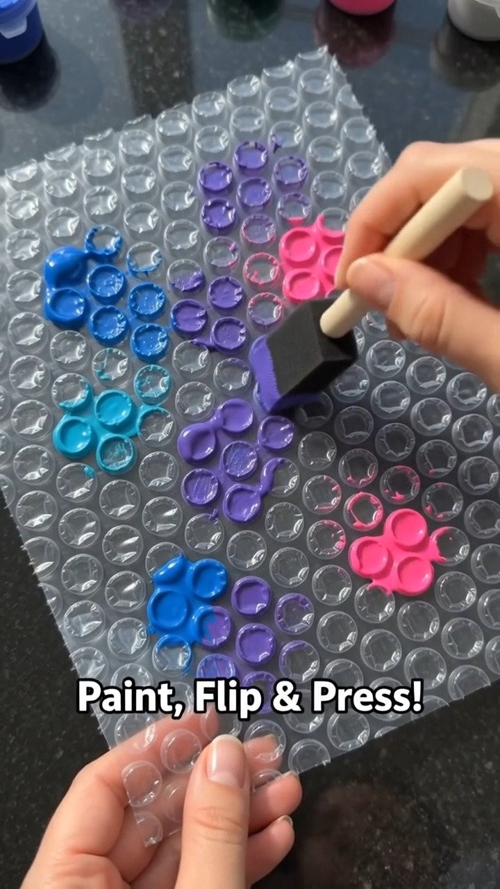 Bubble wrap stamps create colorful galaxy patterns with stars, planets, and deep space texture. A fun project to try this weekend. #GalaxyWallArt #BubbleWrapPainting #KidsDIY #CreativeCrafts