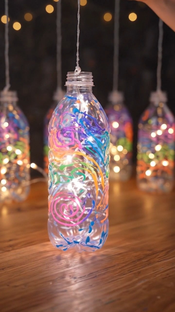 Neon colors swirl through clear bottles to create glowing lanterns with a fun, dreamy look. Perfect for your next craft day.